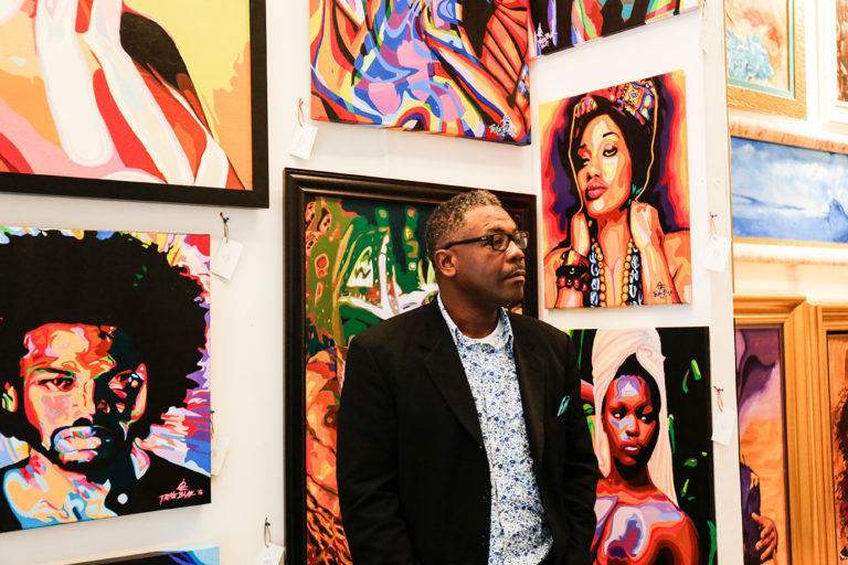 Artist Oscar Lester prepares to answer questions about his art
