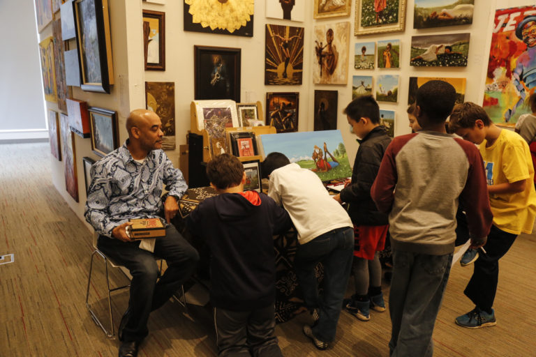 Local students participate in a day of art enrichment and inspiration with artist Jerome T. White.